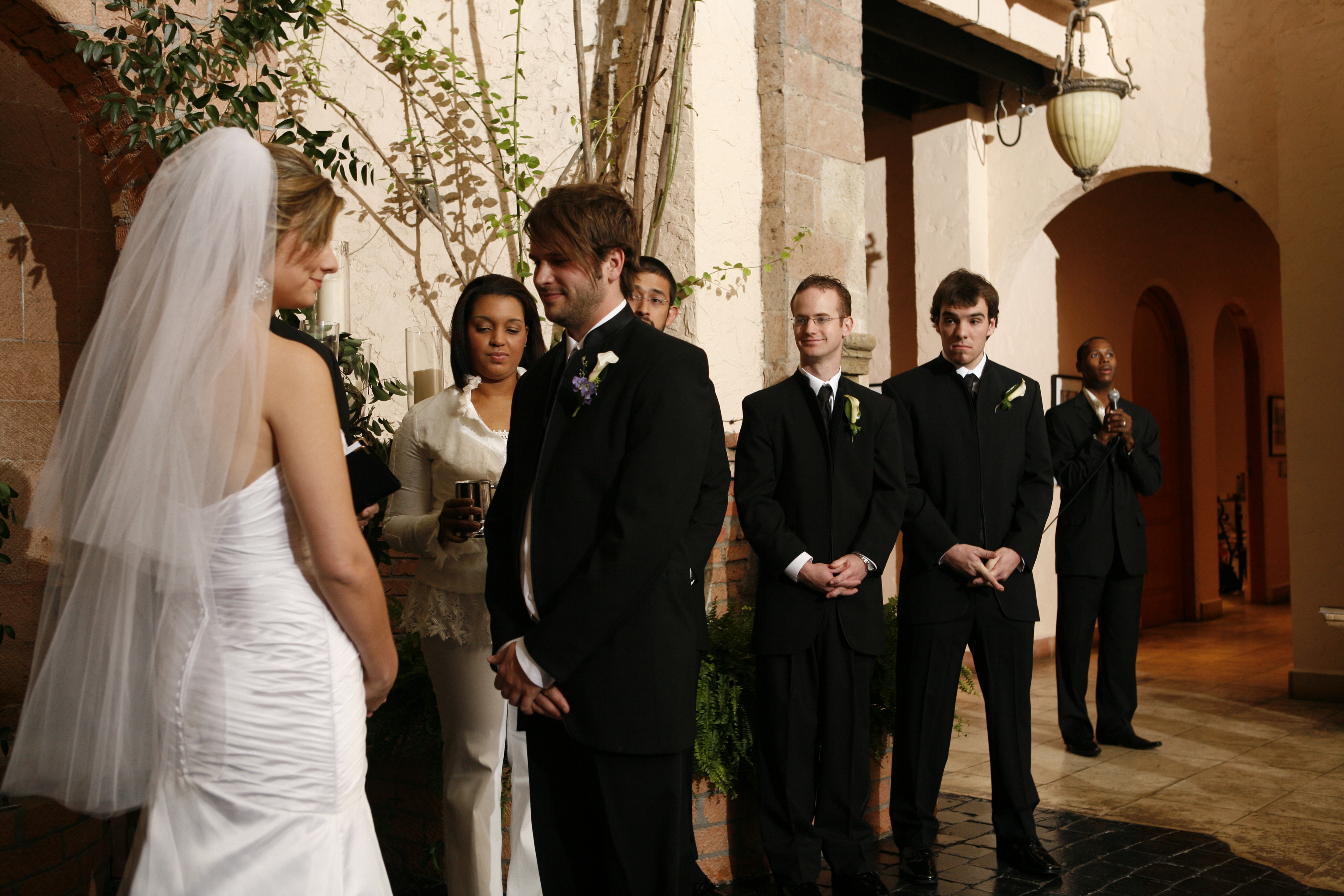 Taylor and Stephanie receiving communion at their wedding &mdash; Heidi Stampley serving, Micah Stampley singing a solo in the background