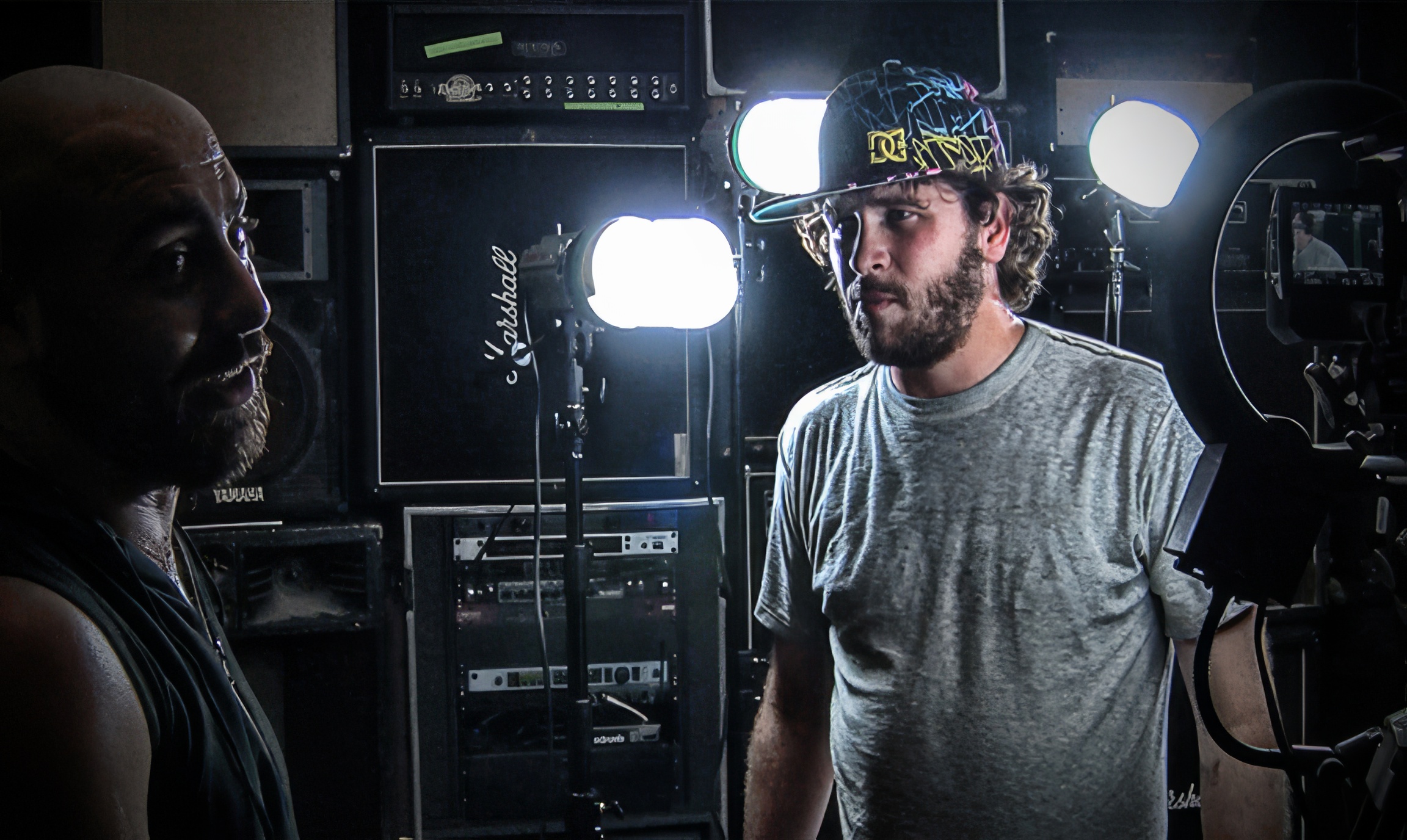 Behind the scenes &mdash; Taylor on set with two Photoflex Starlites lighting the band