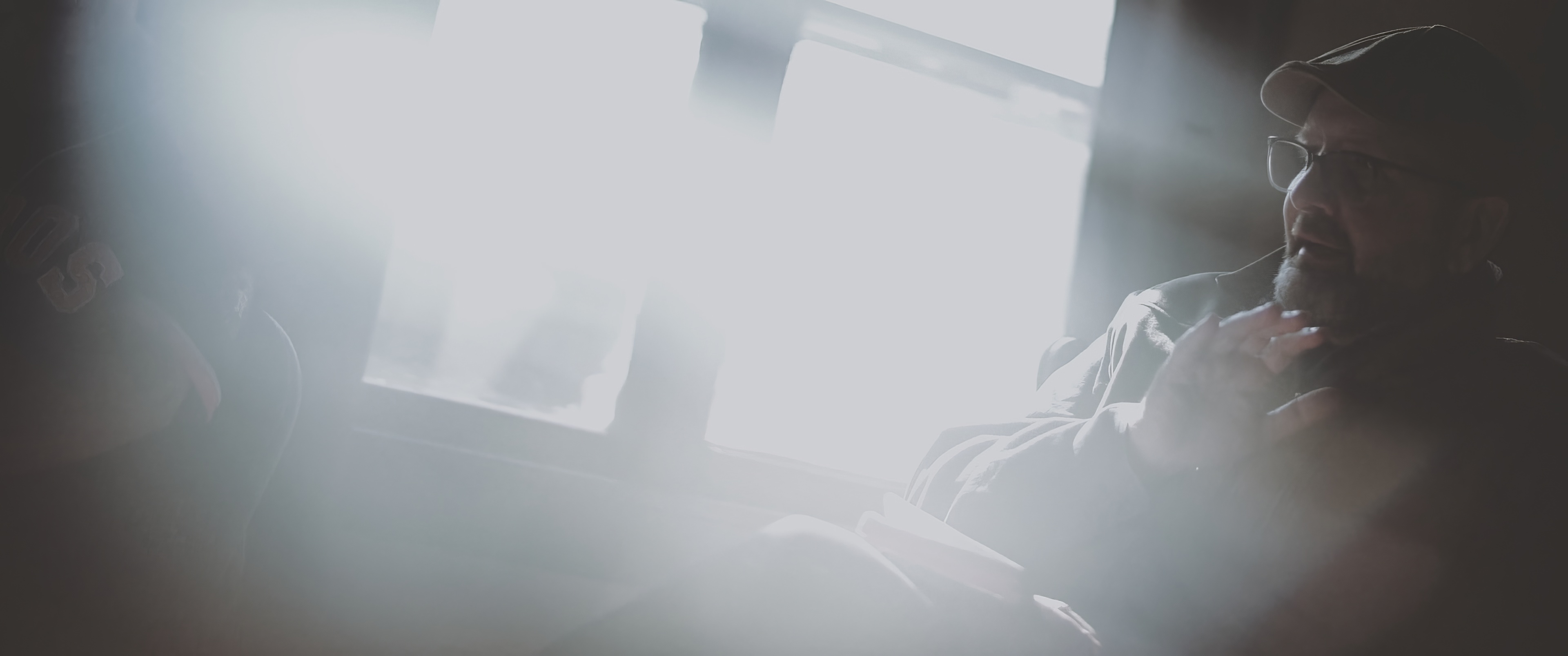 ReGroup — backlit portrait of a member sharing