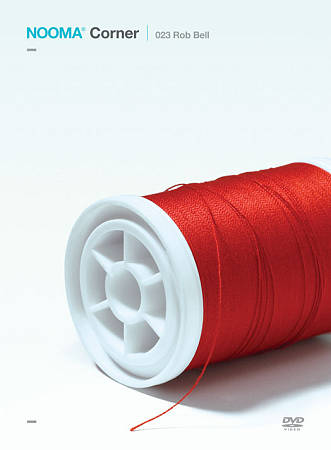 NOOMA 023 Corner — official DVD cover art, featuring a red spool of thread on a white background.
